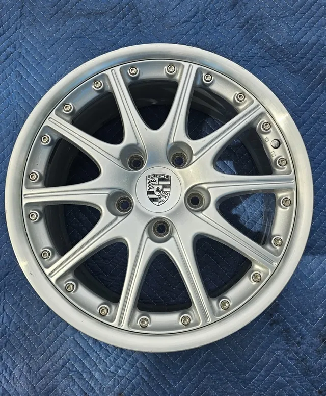 One of the OEM 18-inch two-piece Sport Design wheels